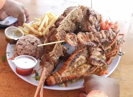 Fish, lobster and shrimp on the Blue Bayou platter in Gabriel’s Belize vlog