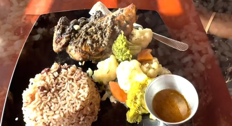 Chicken, rice and vegetables at Bourbon Barrel, from Flair By Pierre’s Belize City vlog.