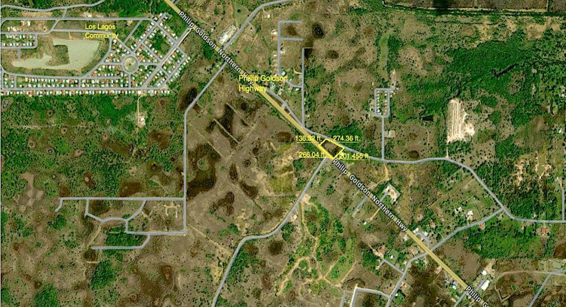 1.06 Acre Property with 266.04 ft. along the Phillip Goldson Highway