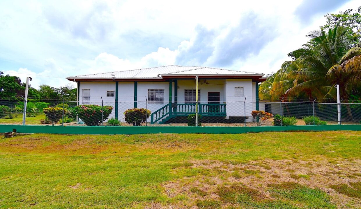5 Parcels Including Furnished Home & Guest House – 1 Mile West of Dangriga Town