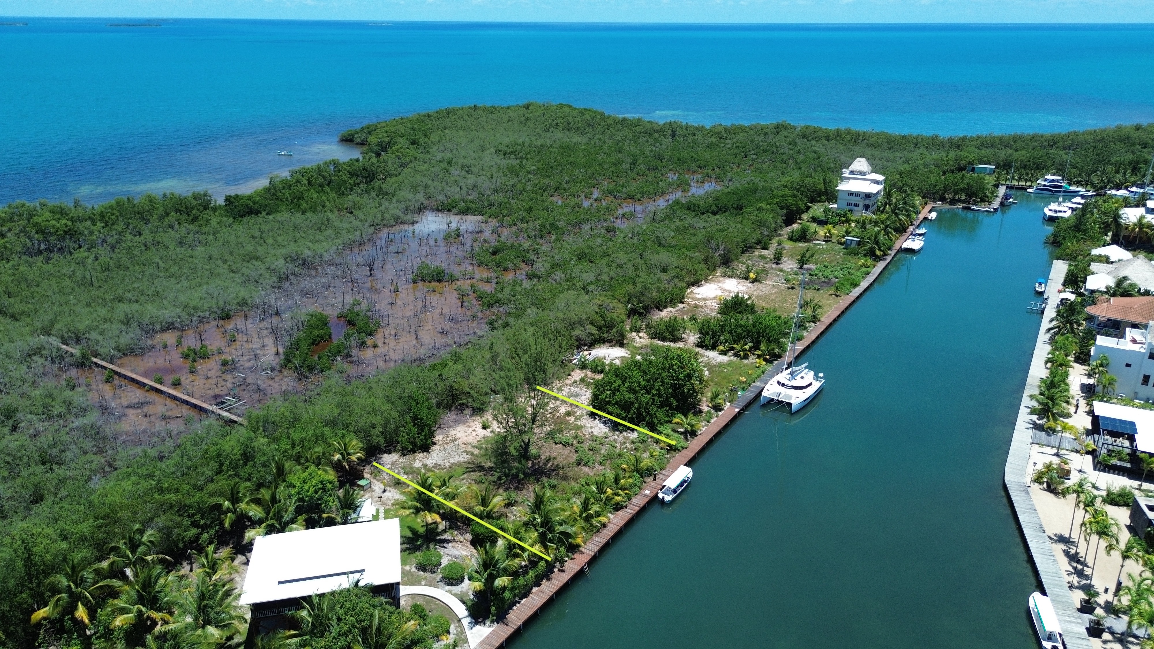 PL0221 – Placencia Caye Gem – Canal front Lot in a Coveted Location
