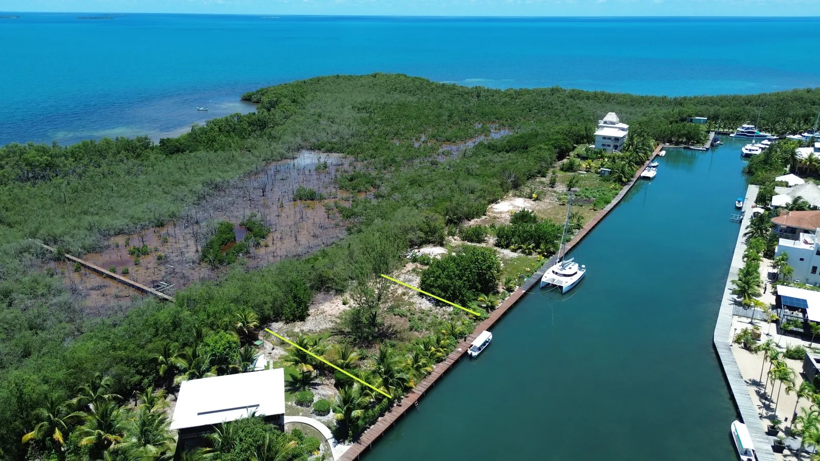PL0221 – Placencia Caye Gem – Canal front Lot in a Coveted Location