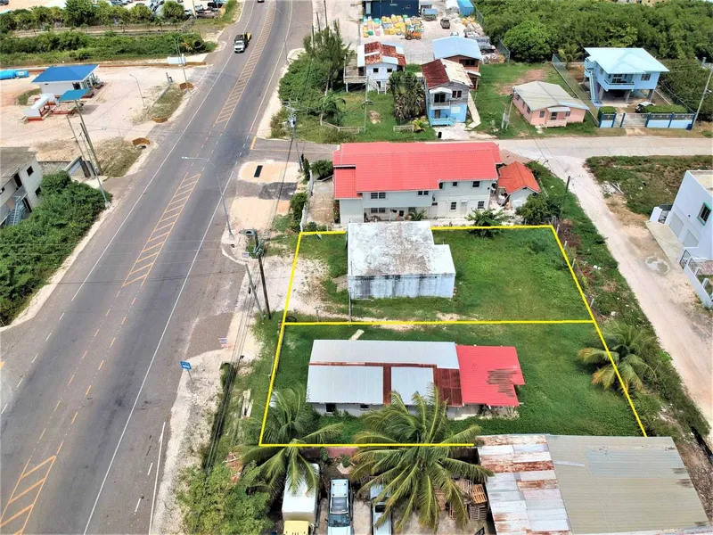 BZ148: 2 COMMERCIAL LOTS WITH ONE COMMERCIAL BUILDING AND 1BUNGALOW HOME AT MILE 4.5 PHILIP GOLDSON HIGHWAY NEAR HAULOVER BRIDGE, BELIZE CITY! BELIZE CITY REAL ESTATE! COMMERCIAL PROPERTY FOR SALE IN BELIZE CITY!