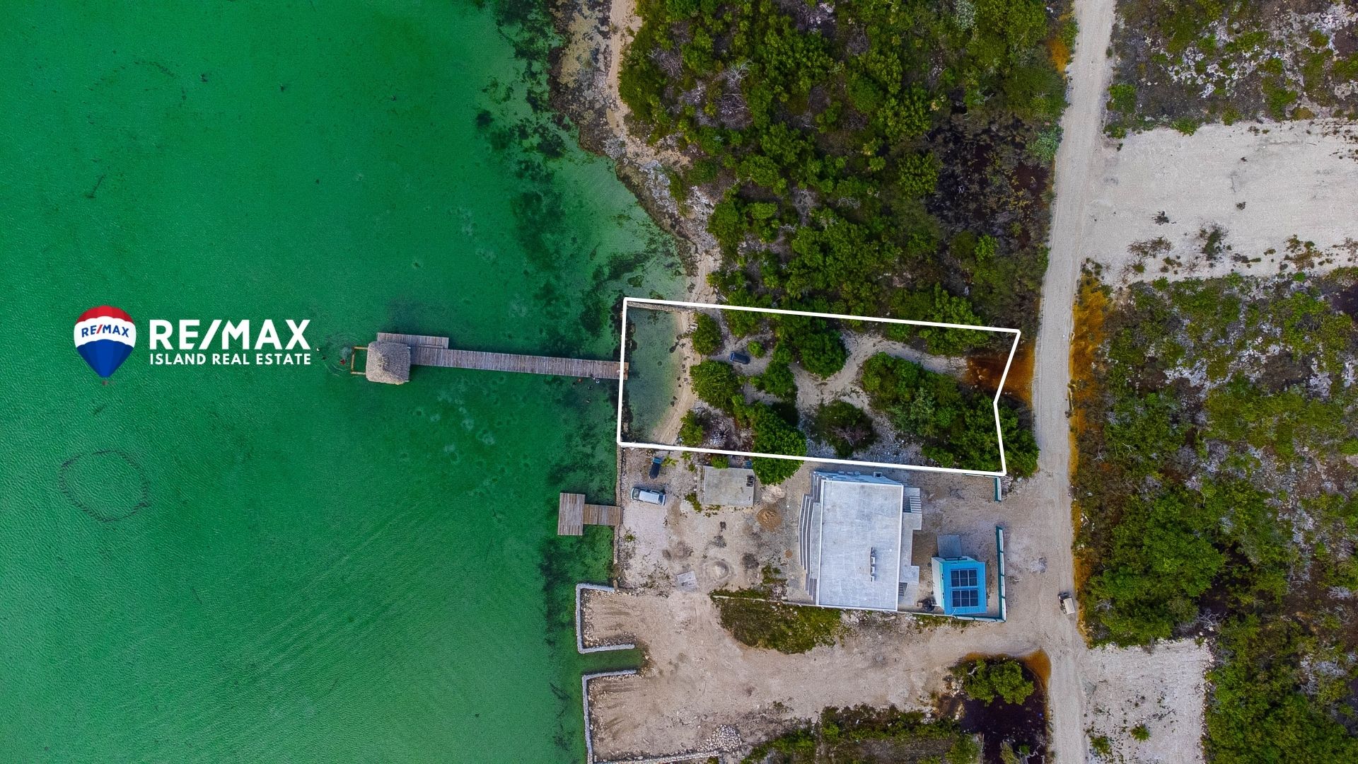 Prime Secret Beach Beachfront Property – Road Access and Pier