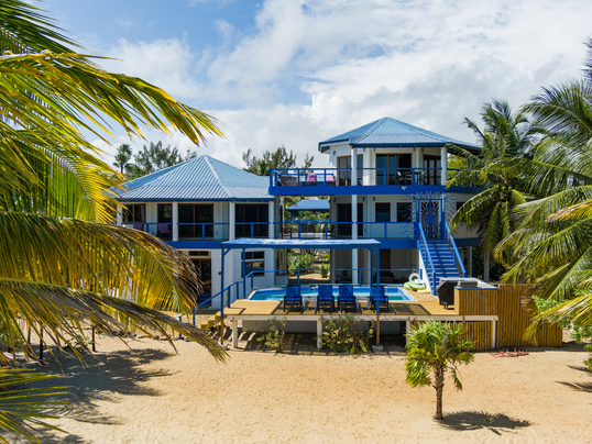 AM-B1004 - Boutique Villa 5 Rentals with 11 beds on 120 feet of Beachfront! Seller Financing Available