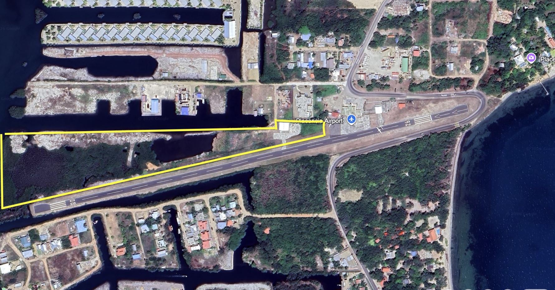 LAND, SEA AND AIR ACCESS. Runway access for hangars – 10 Acres WATERFRONT at Placencia Harbor Docks Marina – Listing 4502