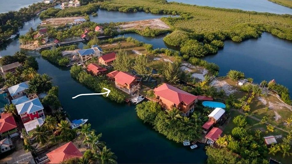 Exceptional Placencia Village Island Home | 2 Bedrooms, Loft, Separate Studio Cabana & Boat Dock
