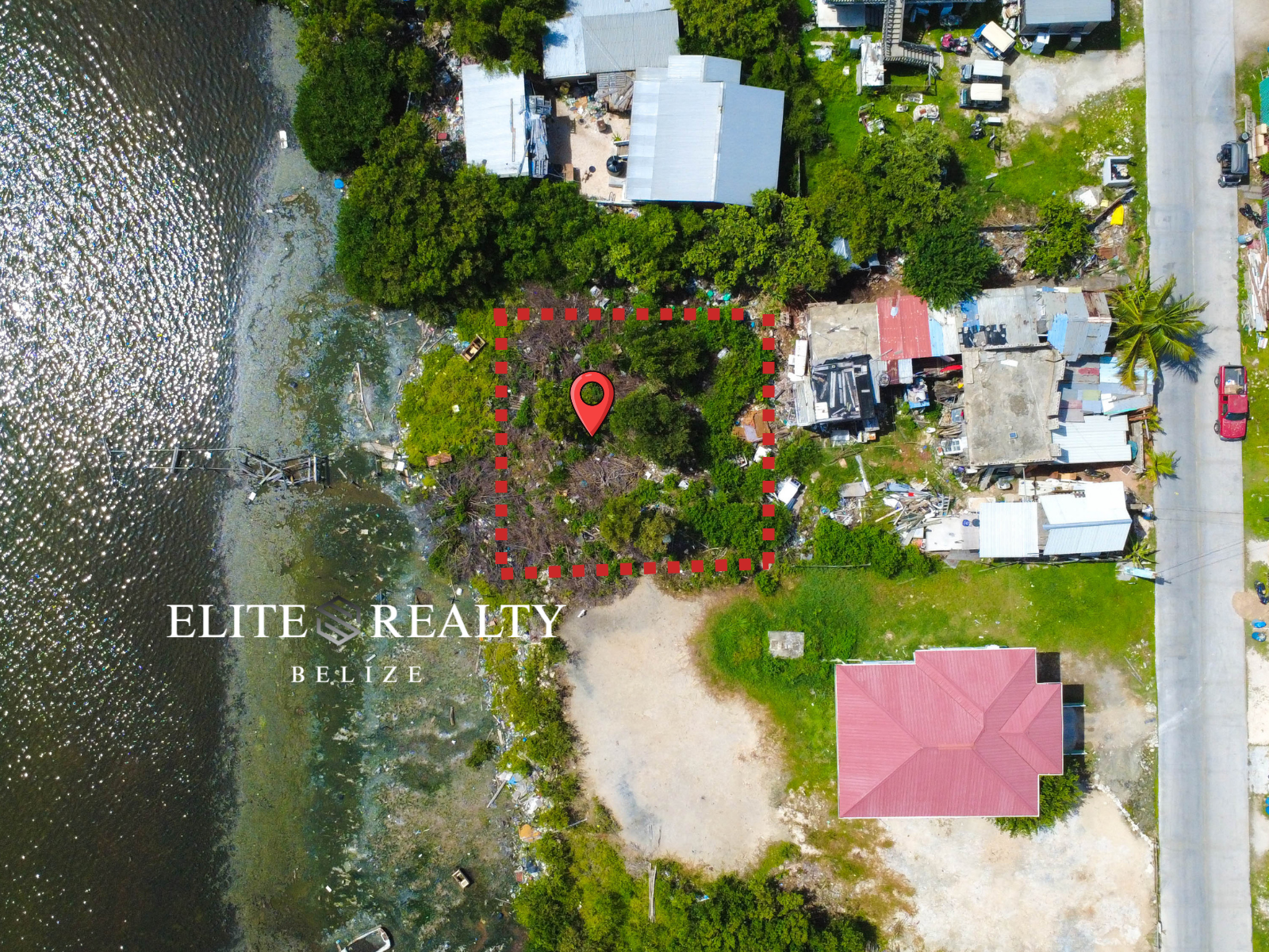 SAN PEDRO WATERFRONT FOR ONLY US$105K! Titled Lot Minutes from San Pedro Town, Belize