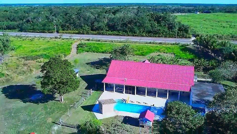 Residential 4-bedroom Home, on 65 acres of fertile land, near Corozal 4-mile lagoon.