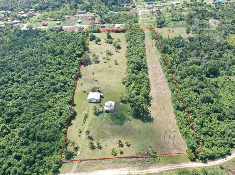 10-Acre Farm with Rustic Home and Steel Warehouse in Camalote Village, Cayo