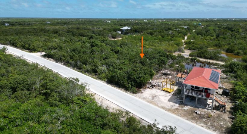 Main Road Lot Package On Paved Road To Secret Beach!