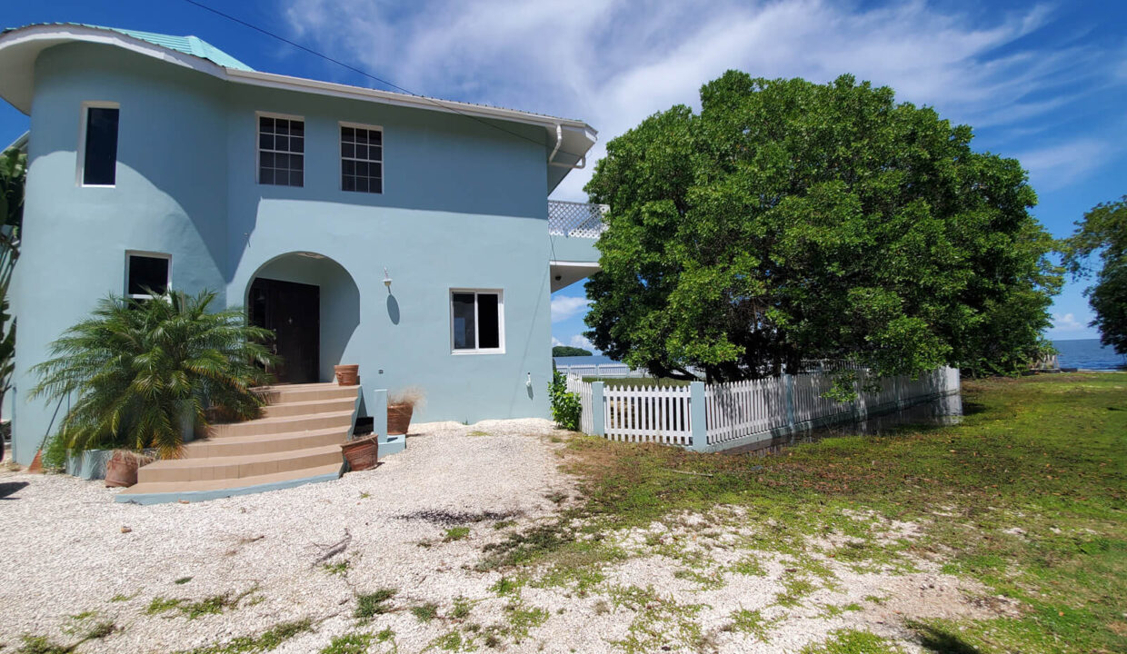 Majestic Water front 5-Bedroom Split-Level Home with Caribbean Sea Views