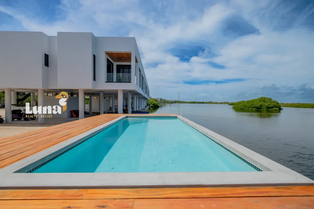Mangrove Bay #8 – Brand-New Waterfront Condo with Rooftop Veranda & Boat Slip