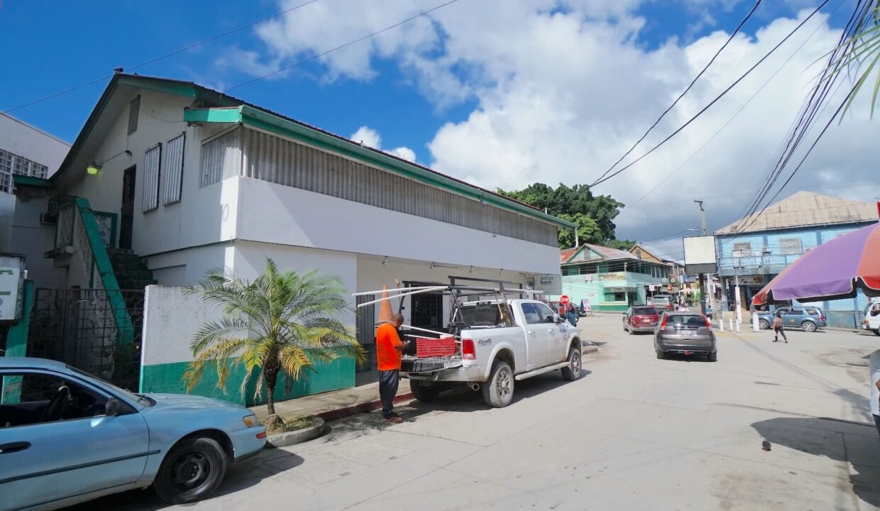 Prime Location: Fixer-Upper 2-Storey Building – 2 Lots – Burns Ave., San Ignacio