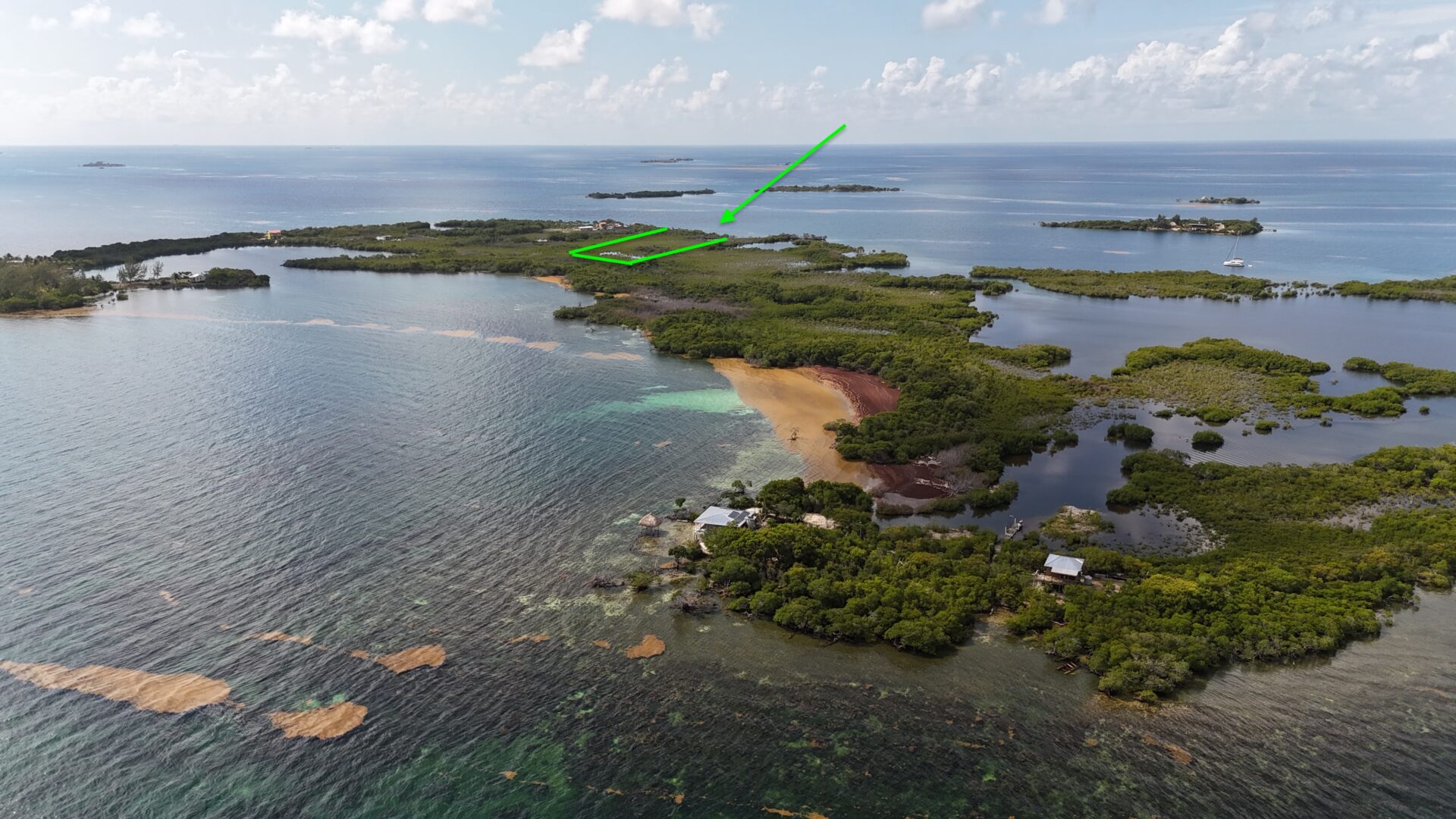 PI0055 – Lark Caye Central | Stunning 3.402-Acre Caribbean & Lagoon Frontage