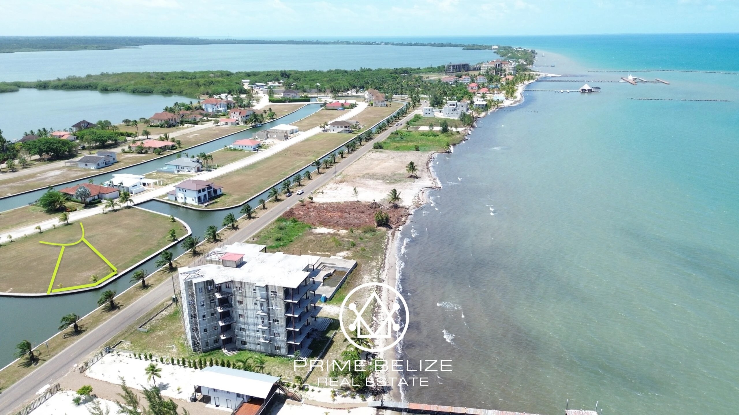 PL0057 – Waterfront Living: Canal Lot with Ocean Views in Gated Placencia Community