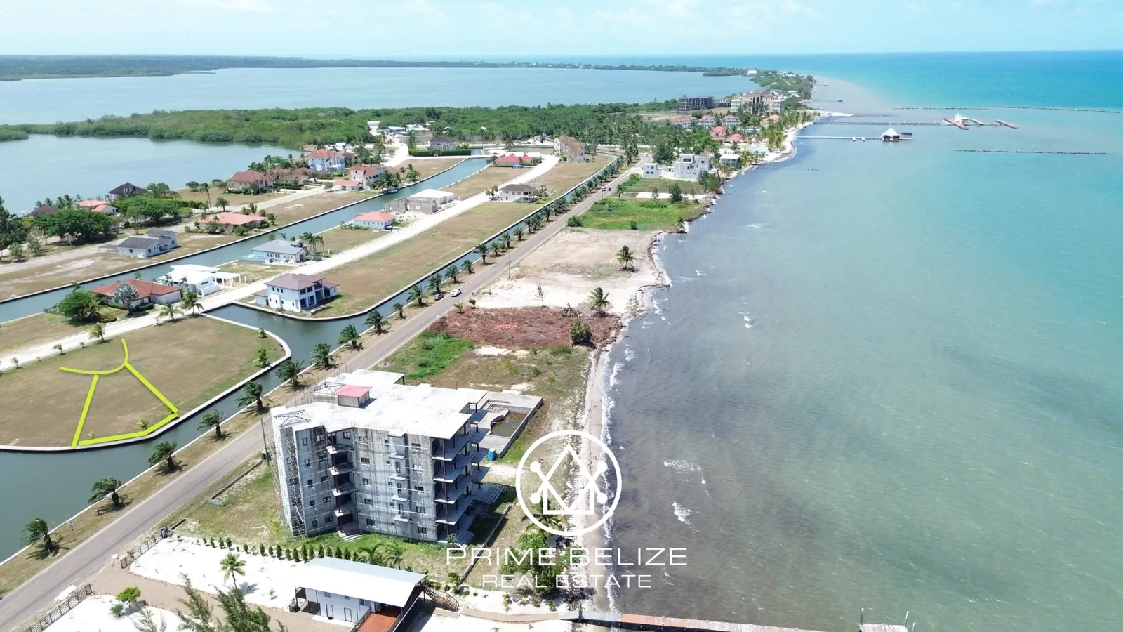 PL0057 – Waterfront Living: Canal Lot with Ocean Views in Gated Placencia Community