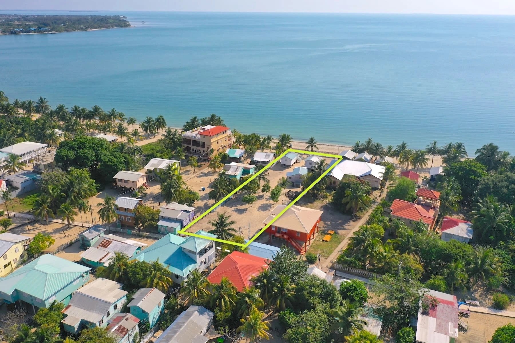 PL0113 – Unique Beachfront Lot on Placencia Sidewalk – Perfect for Your Vision