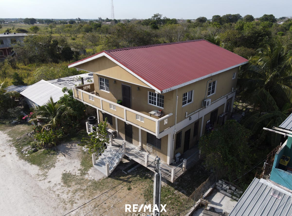 San Martin Street, third two-story green house from the corner of Yo Creek St., Orange Walk, Orange Walk District, Orange Walk, Orange Walk District
