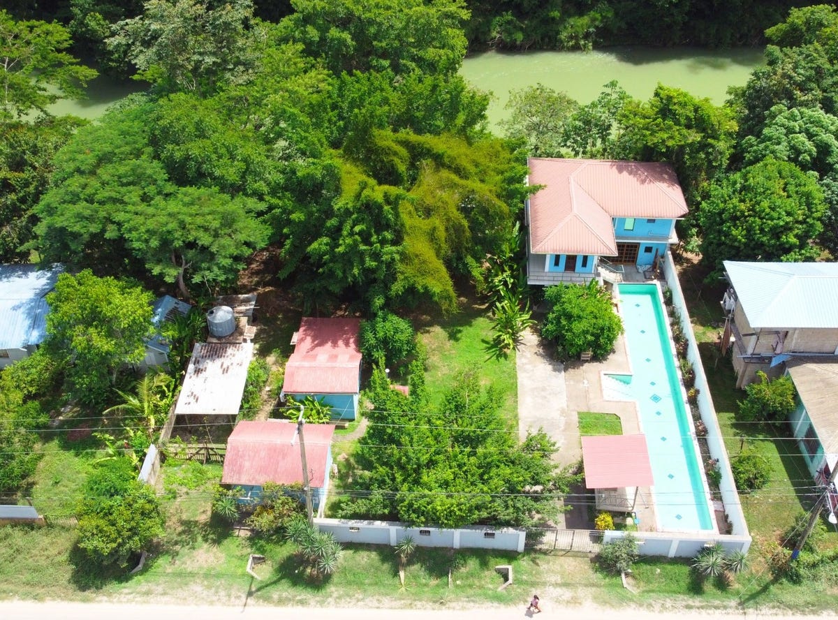 Riverfront Property with 5 Buildings in Bullet Tree Falls, Cayo District, Belize $290,000, Bullet Tree Falls, Cayo District, Bullet Tree Falls, Cayo District