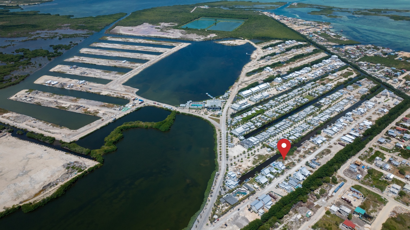 Canal-Front Lot with Seawall in Mahogany Bay Village 