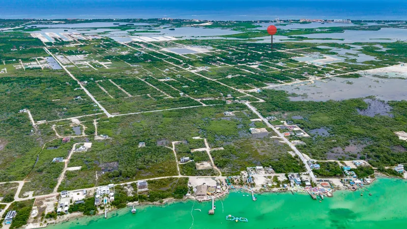 Lot 1253 – Prime Corner Property in West Caye Near Secret Beach | $80,000 USD