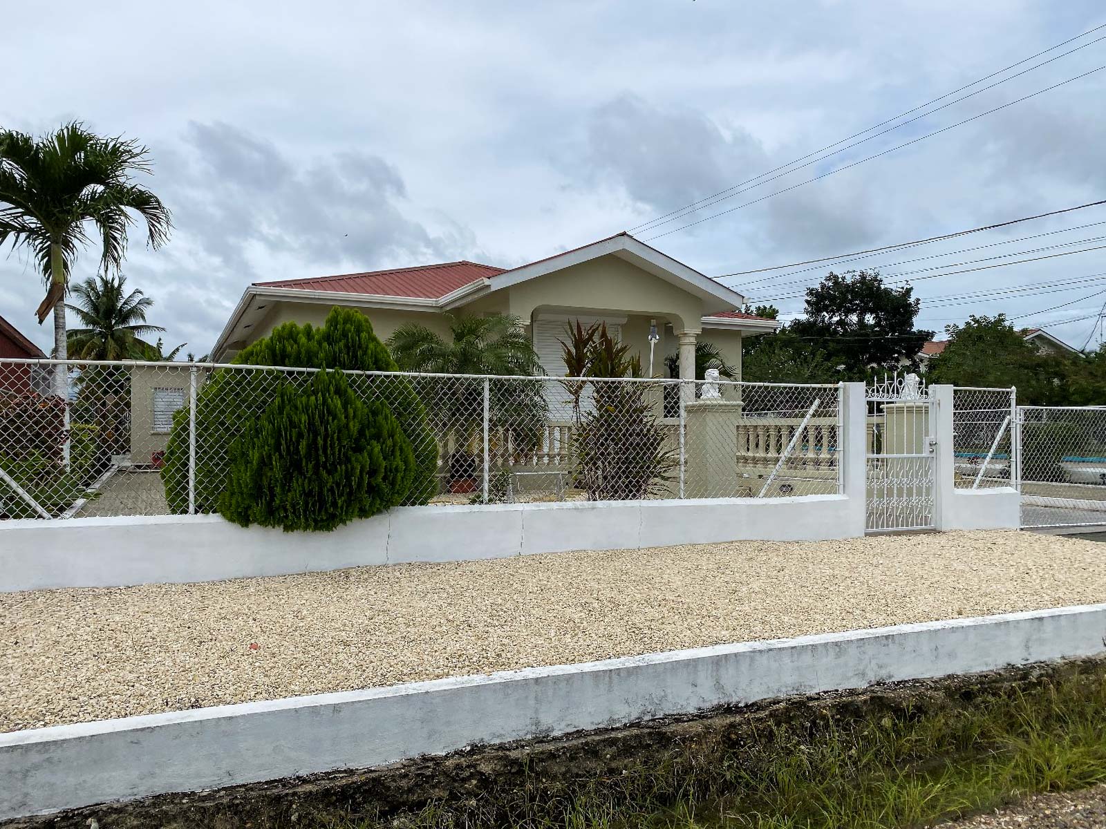 4 Bed, 3 Bath Corner Lot Home with High Ceilings & Elegant Touches in Quiet Belmopan Neighborhood