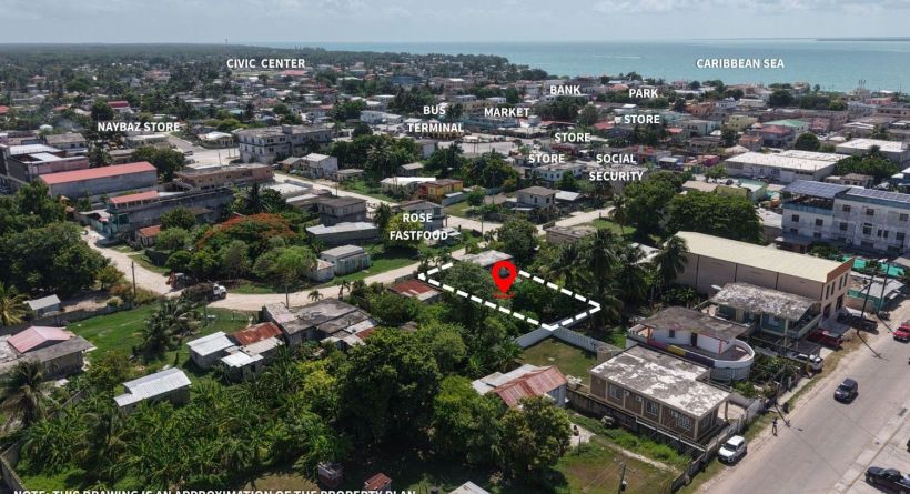 Spacious Two-Story Fixer with Endless Possibilities in the heart of Corozal Town