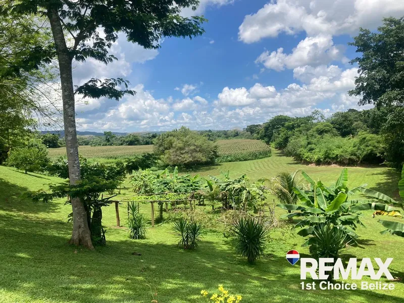 *Stunning Riverfront Oasis at the Confluence of Mopan and Macal Rivers*