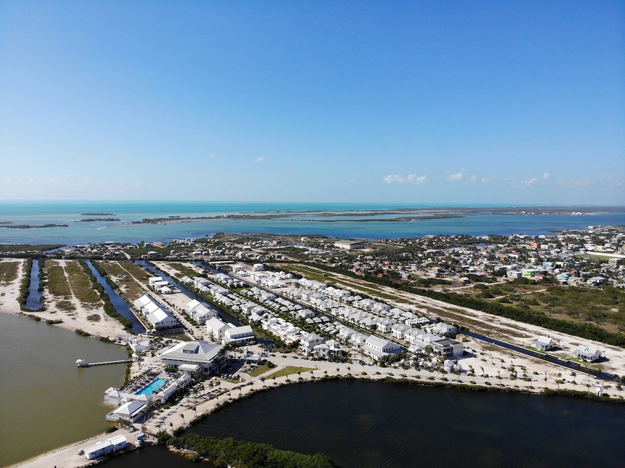 1537- Waterfront Lots in Mahogany Bay Village On Canal With Developer Financing