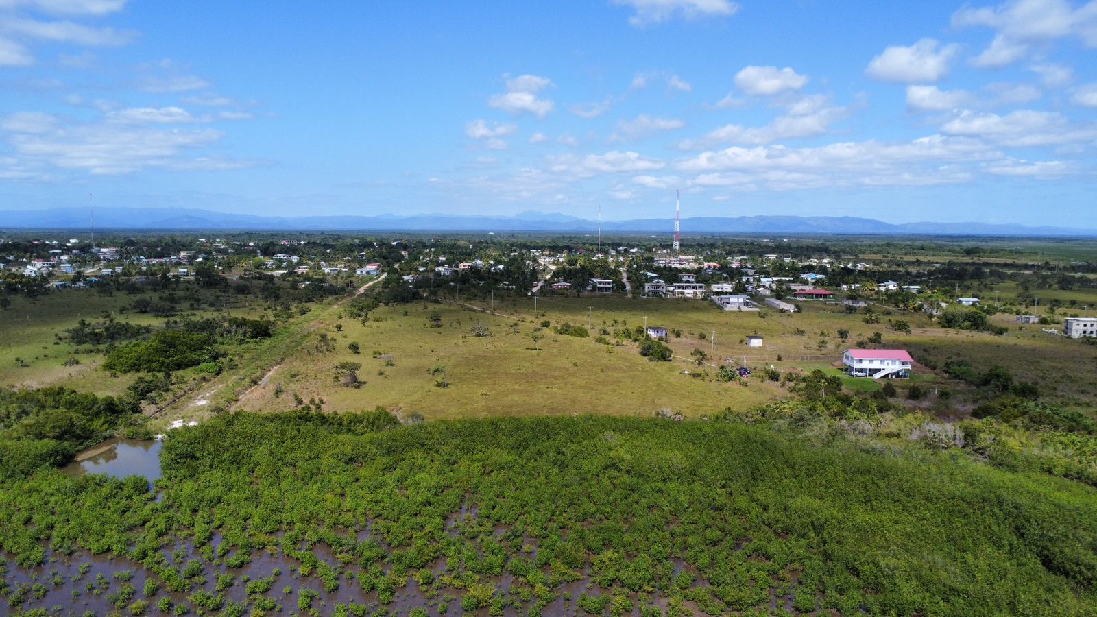 Waterfront Parcel on Placencia Lagoon — Prime Investment in Independence Village