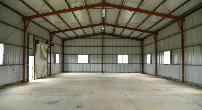 6,400 sq ft Industrial Warehouse Complex on 5 Acres; Frontage on Bourdon Canal - Image 6