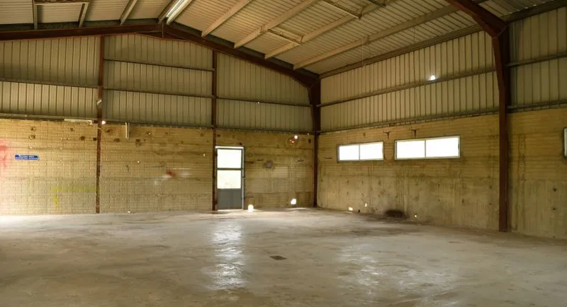 6,400 sq ft Industrial Warehouse Complex on 5 Acres; Frontage on Bourdon Canal - Image 10