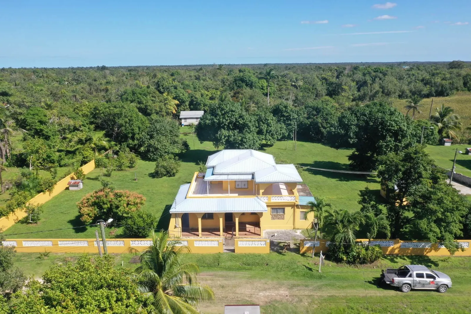 1.5 Acre Mini Estate with 4 Bed, 2 Bath Home, Office Building and 7-Bay Garage