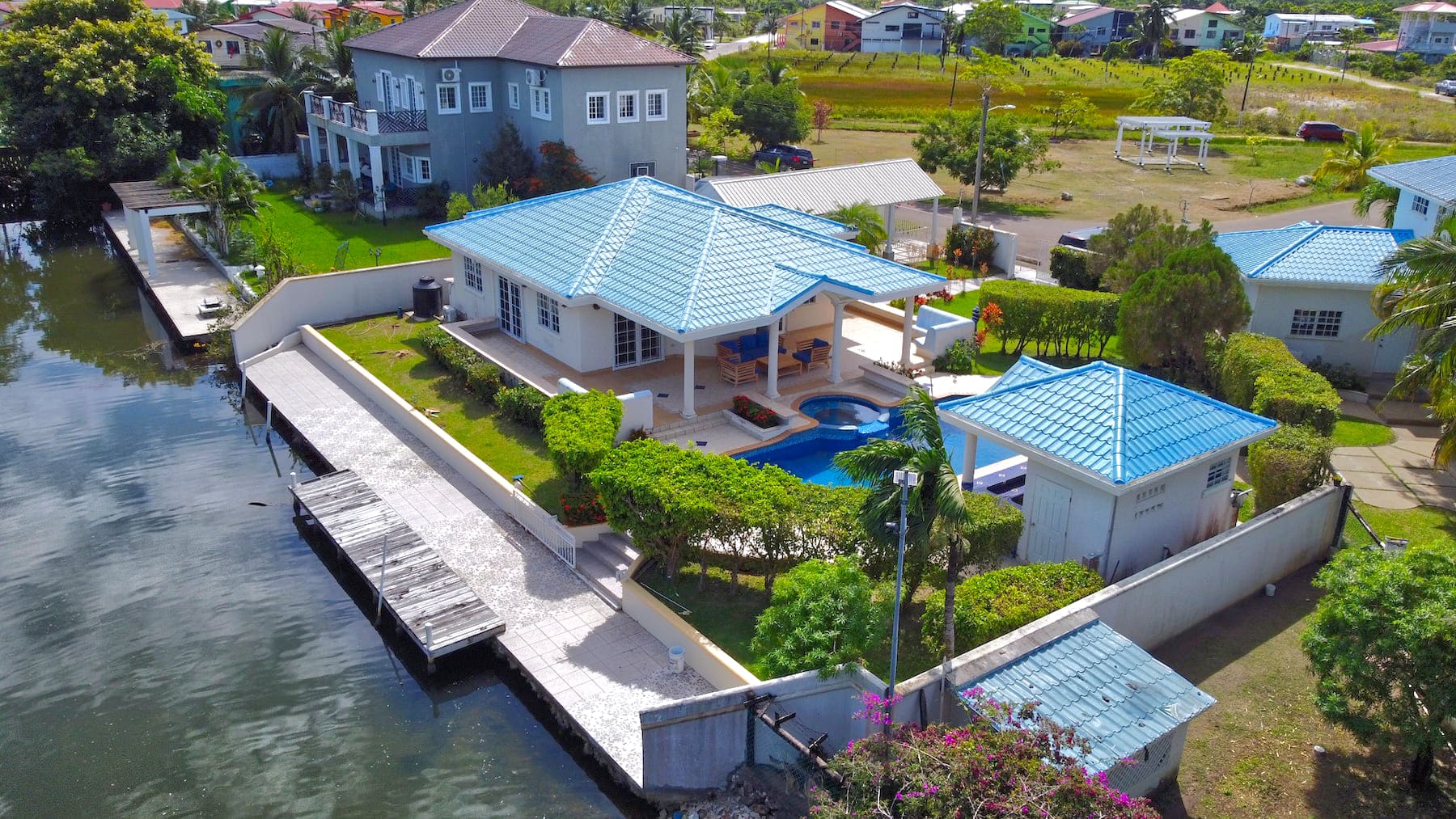 Waterfront Oasis: Modern Guesthouse & Pool in Vista Del Mar, Ladyville, Belize