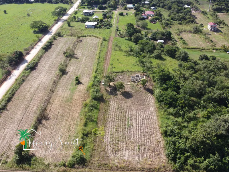 #4205 – Unfinished Concrete Home on 0.64 Acres near San Ignacio Town, Cayo District, Belize