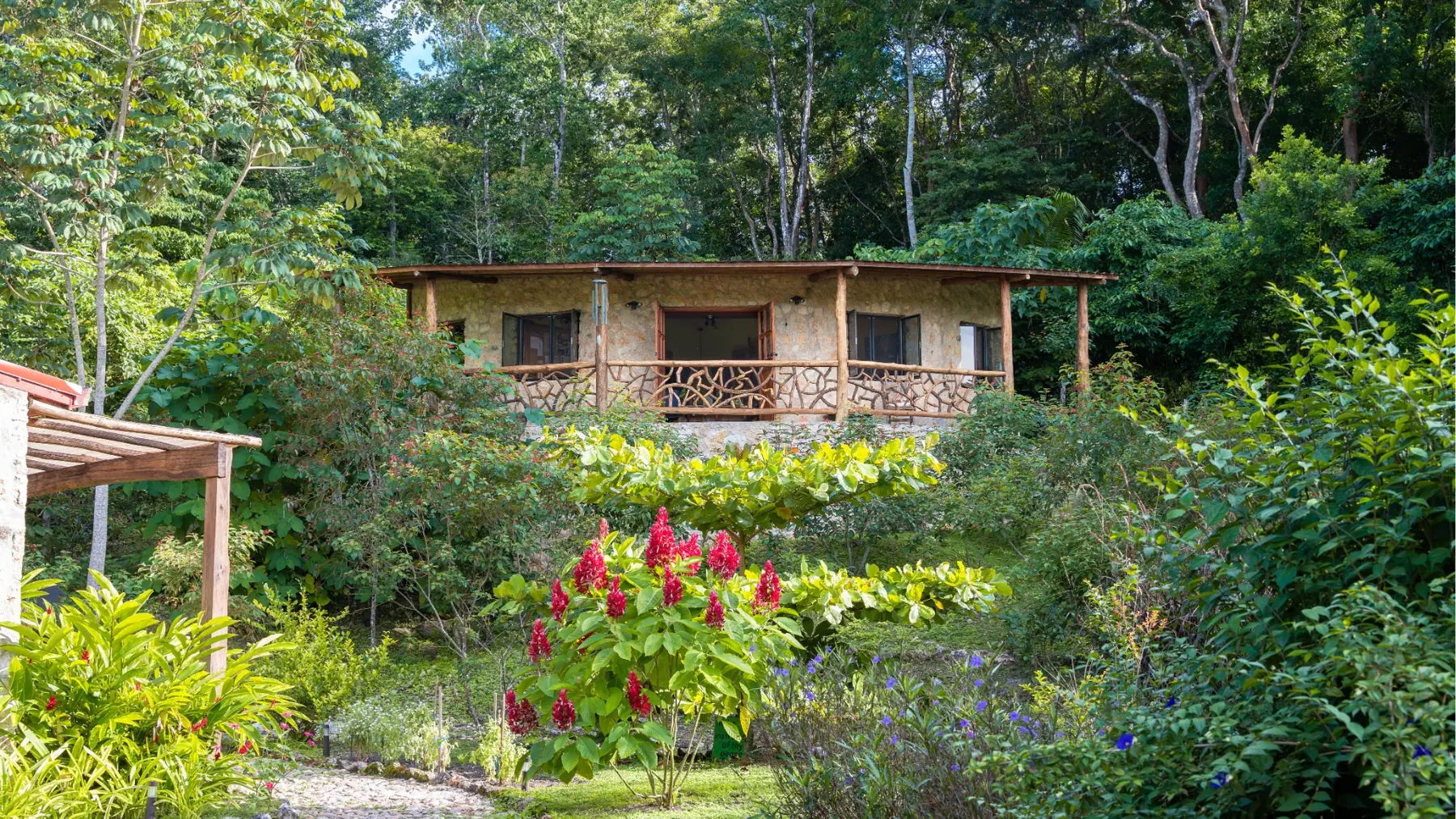 #4235 – Spectacular Off-Grid Mayan Retreat with Two Stone Buildings + 2 Acres of Land + Pond near San Ignacio Town, Cayo District, Belize