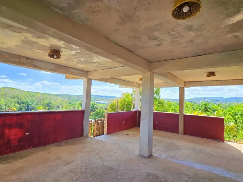 #4240 -Prime Investment in Benque Viejo Town, Belize – Concrete Building with Mountain Views, Pool Potential & Utilities