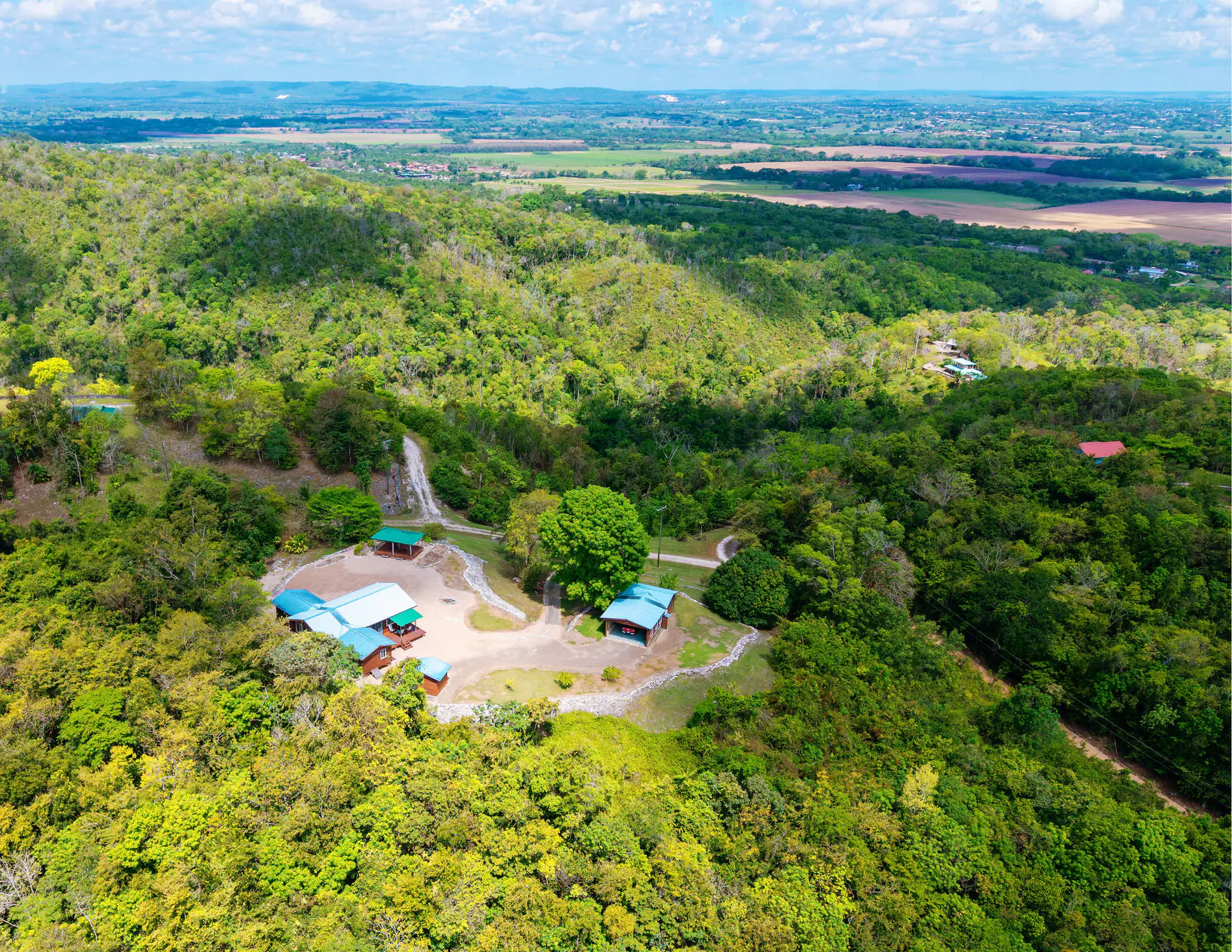 #4242 – Move-In Ready Hilltop Two Bedroom Home with Guest Cottage on 1.4 Acres – Floral Park, Cayo District, Belize