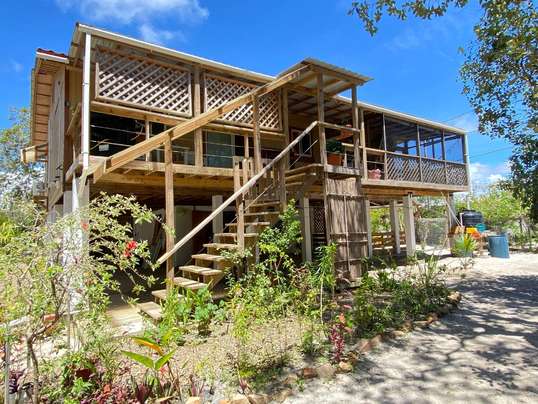 AM-H1002 - Zen Beach Escape: 4-Bed Home w/ Income Studio Steps from Placencia Beach