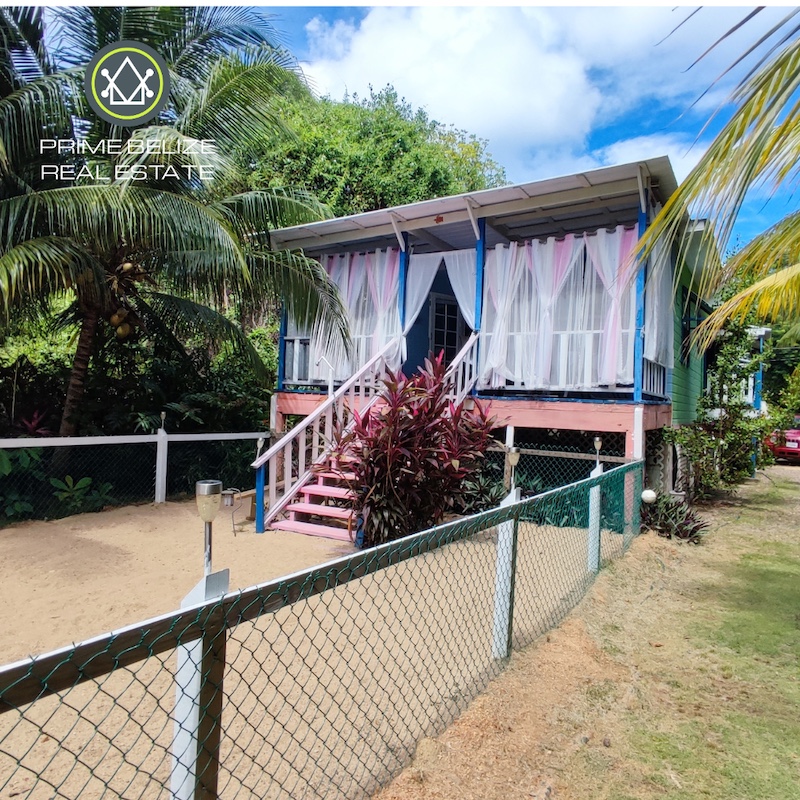 PH0071 – The Mural House – Prime Canal Front & Road Front Property in Placencia, Belize