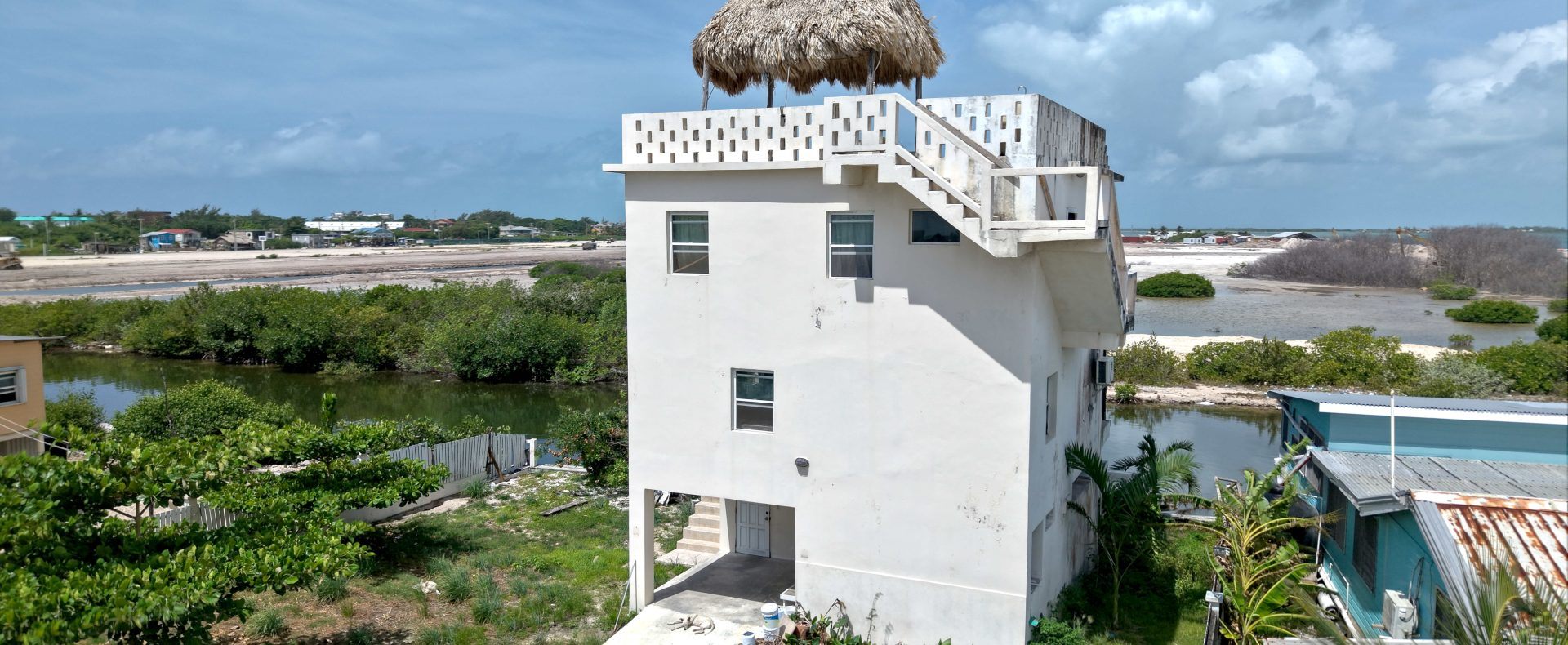 Canal-Front Home with Rooftop Terrace & Lagoon Views | San Pedrito, Ambergris Caye, Belize